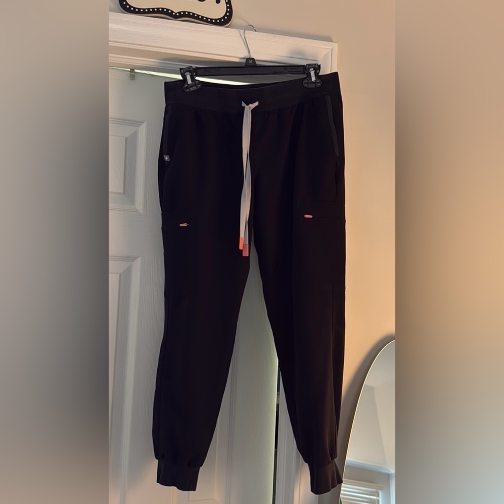 Special edition figs joggers black with peach/orange embellishments